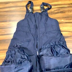 One piece blue snowsuit size 7 in great condition worn one season only